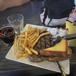 Champions Sports Grill - Steak special with champs fries and Jonnie Walker Black