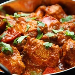 Eastern Eye - House special Chettinad Chicken curry made with 12 ground spices