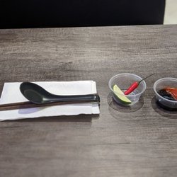 Pho VietStar - Chopsticks and soup spoon with napkins, along with extras