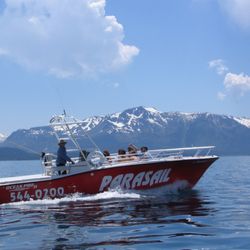 Ski Run Boat Company - Parasail Lake Tahoe Mt. Tallac backdrop