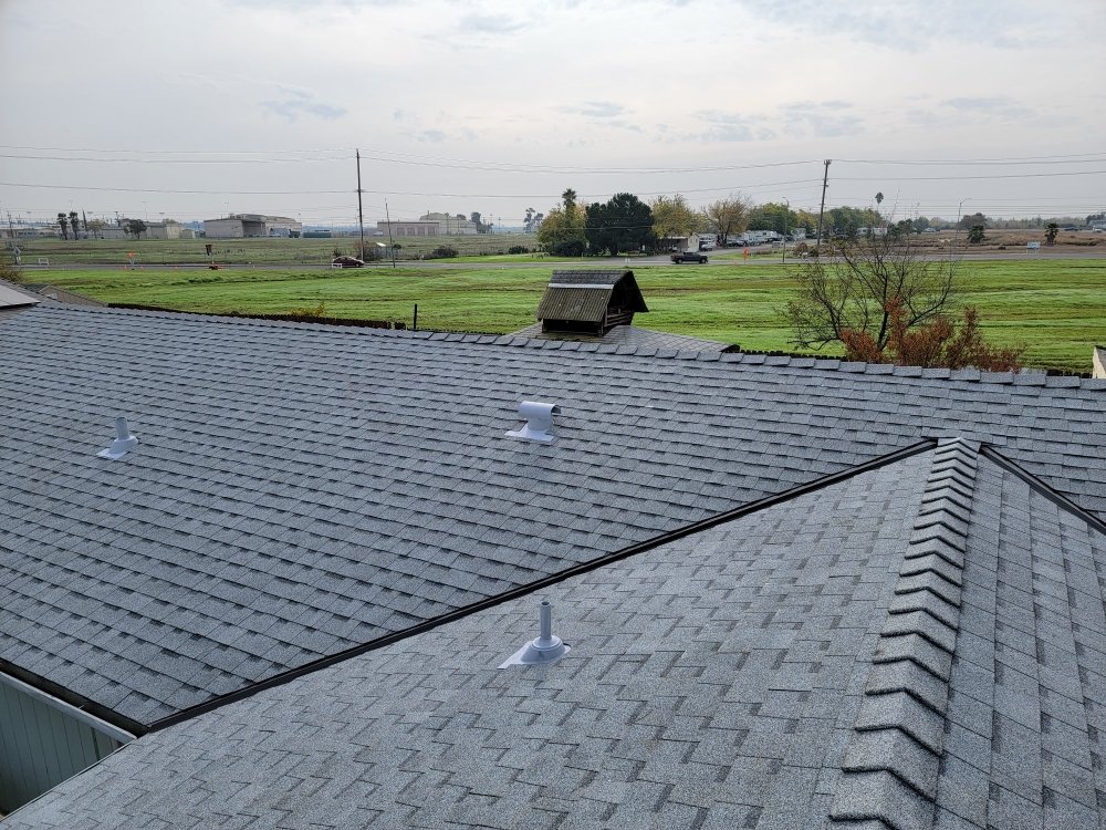 Slide of Blue Lake Roofing