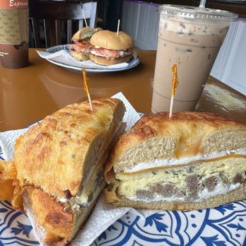 Bagelicious Café - Egg, cheddar, sausage on 5-cheese bagel. Lox bagel. Coffee & Chai - Bagels Near Me - Ventura, California
