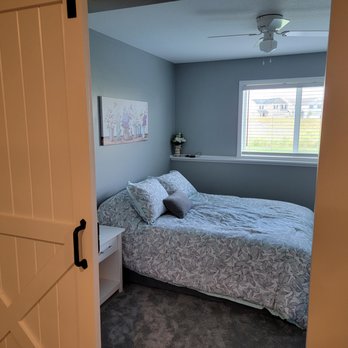 Get It Rite Construction - a bedroom with a bed and a window - General Contractors Near Me - Zimmerman, Minnesota