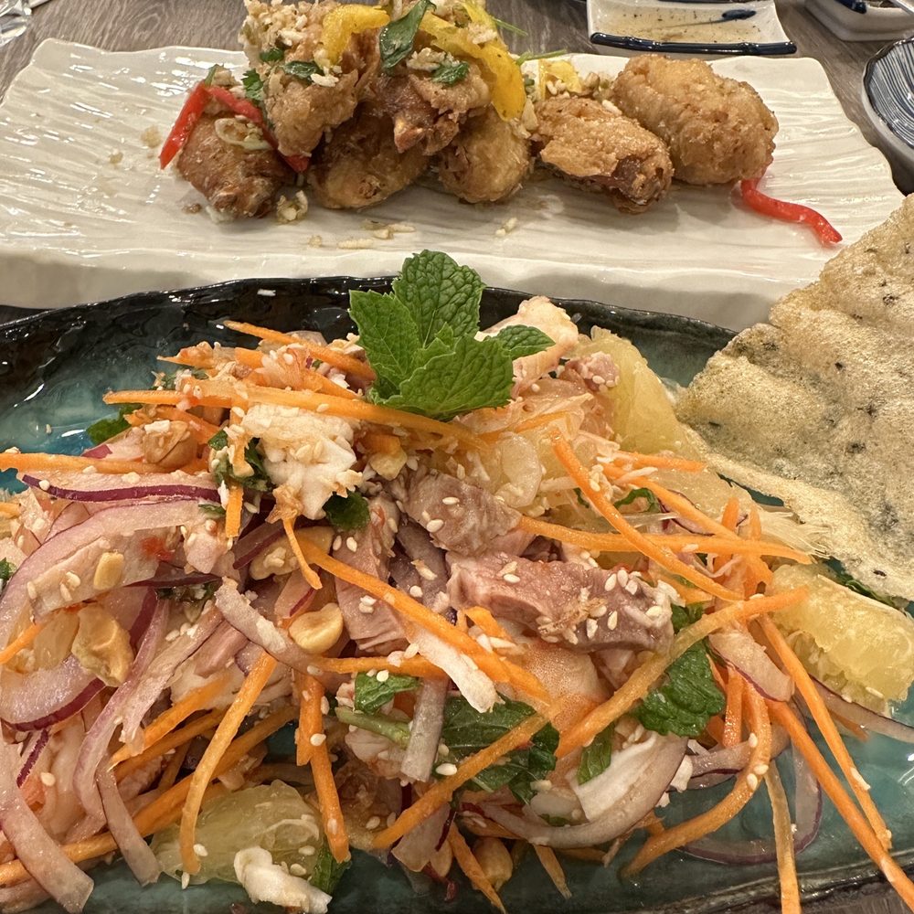 Hai Chi Em Modern Vietnamese Restaurant - pomelo shrimp and pork salad, and crispy garlic butter wings - Vietnamese Near Me - Vancouver, British Columbia Hai Chi Em Modern Vietnamese Restaurant - pomelo shrimp and pork salad, and crispy garlic butter wings - Vietnamese Near Me - Vancouver, British Columbia