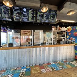 Hole In The Wall - Inside with menu board