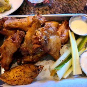 BJ's Restaurant & Brewhouse - Wings with dry rub - Pizza Near Me - Gainesville, Virginia