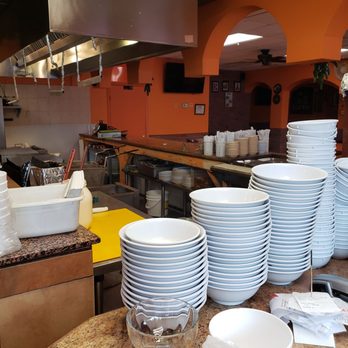 Taquería Doña Raquél - stacks of plates and bowls - Mexican Near Me - Pompano Beach, Florida Taquería Doña Raquél - stacks of plates and bowls - Mexican Near Me - Pompano Beach, Florida