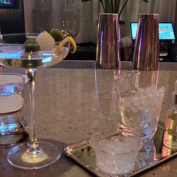 Miaou Miaou - a bar with glasses and flowers - Lounges Near Me - Minneapolis, Minnesota Miaou Miaou - a bar with glasses and flowers - Lounges Near Me - Minneapolis, Minnesota