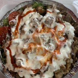 Chicken & Lamb Gyro plate-also contains rice, romaine, and white sauce with touch of spicy sauce. Very fresh, hot, and delicious!