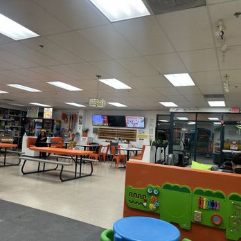 Kangamoo Indoor Playground - Adult lounge with tables, massage chairs and even an elliptical to get your workout on while your child plays, creative! - Kids Activities Near Me - Las Vegas, Nevada