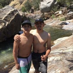 Buckeye Flat Campground - Me and bro by the river at the rapids.