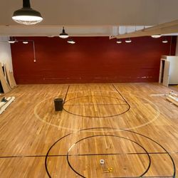 AF&F Carpentry - Floor patching & repaint of all court lines!
