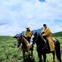 Fantasy Ranch - Amy and I riding through tons of wild flowers