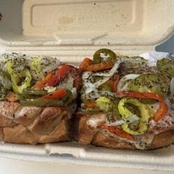 Pizza meatball sub with sautéed peppers, onion, banana peppers, and jalapeño.