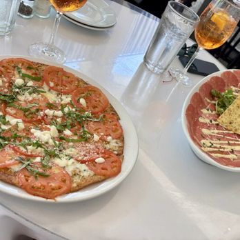 Brio Italian Grille - Margherita flatbread and carpaccio - Italian Near Me - Naples, Florida Brio Italian Grille - Margherita flatbread and carpaccio - Italian Near Me - Naples, Florida