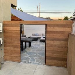 Gate with iron and wood siding Gate with iron and wood siding