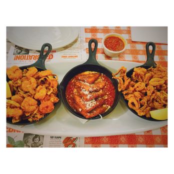 Buca di Beppo Italian Restaurant - Buca Trio Platter:  shrimp, mozzarella and fried calamari. The calamari was very crispy. - Italian Near Me - Redondo Beach, California