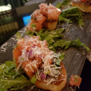 Virgola Wine Bar - Bruschetta with Olive Tamponade, Tomato and Parm - Wine Bars Near Me - Patchogue, New York