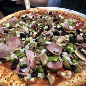 Chef's Pizzeria - a pizza with toppings - Pizza Near Me - Kingsport, Tennessee Chef's Pizzeria - a pizza with toppings - Pizza Near Me - Kingsport, Tennessee