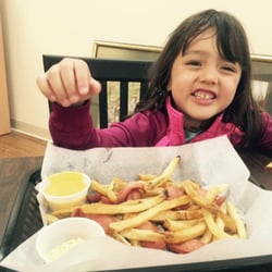 Sanguche - Kids enjoy Salchipapas (French fries + hot dog)