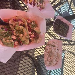 Mahi and blackened shrimp tacos with black beans and lime rice