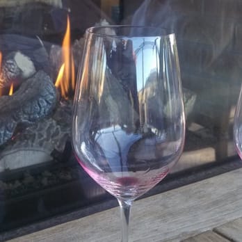 Denner Vineyards - Just sipping next to the fireplace in the tasting room - Wineries Near Me - Paso Robles, California Denner Vineyards - Just sipping next to the fireplace in the tasting room - Wineries Near Me - Paso Robles, California