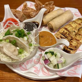 Pink Pepper - Siam Sample - Thai Dumplings, Chicken Satay, Thai Egg Rolls, Cream Cheese Wonton - Thai Near Me - Los Angeles, California Pink Pepper - Siam Sample - Thai Dumplings, Chicken Satay, Thai Egg Rolls, Cream Cheese Wonton - Thai Near Me - Los Angeles, California
