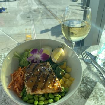 Trader Vics - Teriyaki Salmon Bowl with a glass of Altitude Project Chardonnay - Tiki Bars Near Me - San Jose, California Trader Vics - Teriyaki Salmon Bowl with a glass of Altitude Project Chardonnay - Tiki Bars Near Me - San Jose, California