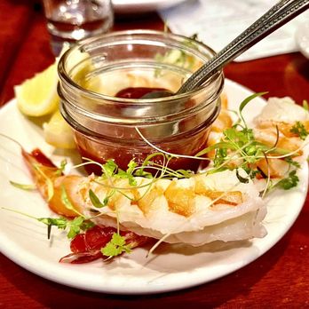 The Diplomat - a plate of food on a table - New American Near Me - Milwaukee, Wisconsin