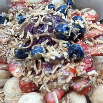 Beyond Bowls and Blends - Bubble waffle with acai, almond butter, toasted coconut, strawberries and blueberries! - Juice Bars & Smoothies Near Me - Glendora, California