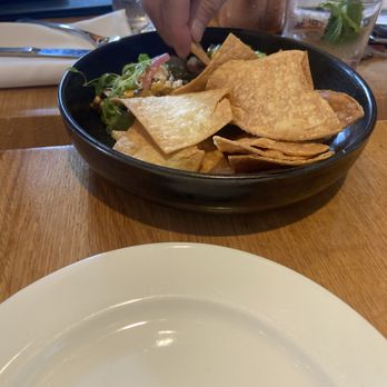 Earls Kitchen + Bar - Nachos with avocado dip - New American Near Me - Miami, Florida Earls Kitchen + Bar - Nachos with avocado dip - New American Near Me - Miami, Florida
