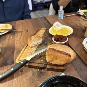 Jamón Jamón - Bread with fresh garlic olive oil and tomato spread! - Tapas/Small Plates Near Me - Henderson, Nevada