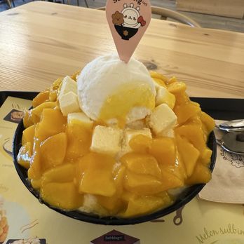 Sulbing Cafe - Mango cheesecake bingsoo. Mango is canned mango, has a syrup-y flavor and is not fresh. - Cafes Near Me - Mountain View, California