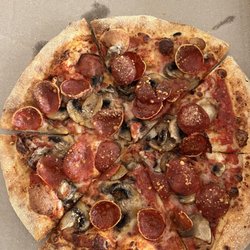 Two Saucy Broads Pizza & Beer Parlor - 10" pepperoni mushroom pizza.