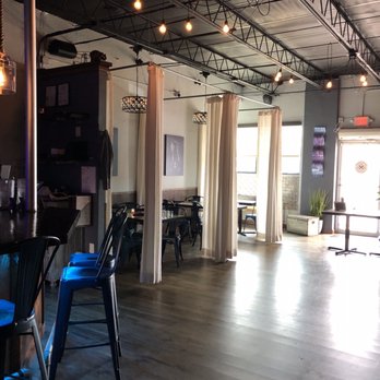 Flavour Kitchen & Wine Bar - Cute seating area - Wine Bars Near Me - Cocoa Beach, Florida Flavour Kitchen & Wine Bar - Cute seating area - Wine Bars Near Me - Cocoa Beach, Florida