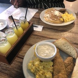 The mimosa flight. The pancake plate for Wifey. The fried fish and grits for me.