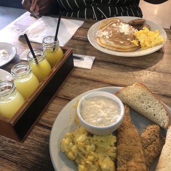 Two Eggs - The mimosa flight. The pancake plate for Wifey. The fried fish and grits for me. - Breakfast & Brunch Near Me - Conyers, Georgia