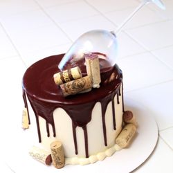 Sugarshida - Funfetti cake with white butter and burgundy ganache drip.