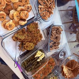 flake - Turkish buffet: Two golden-edged mücver, thick herb-packed zucchini fritters with visible dill running through them, and more. - food - Breakfast & Brunch Near Me - İstanbul, 34