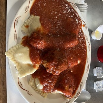 Rocky's - Homemade cheese ravioli, a meatball and an Italian sausage with red sauce. - Italian Near Me - Rochester, New York