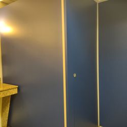 Select Parking at Hampton Inn - The walls go up to the ceiling without any lights inside, so you're basically peeing in the dark.