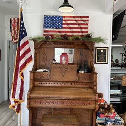 an old piano and american flag an old piano and american flag
