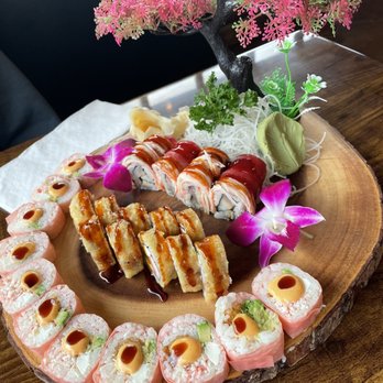 Konnichiwa - Pink roll in front, Tiger Clemson in middle, and Romeo Roll at top - Sushi Bars Near Me - Fort Mill, South Carolina