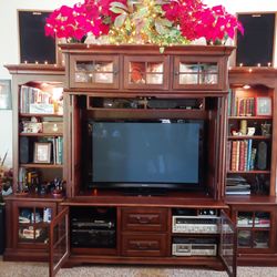 Parts Express - My E-Center with my Klipsch Heresy I's perched on top and the rest of the equipment tucked away below the TV.