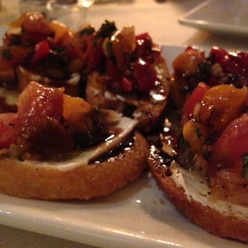 Sheila's Place - Bruschetta appetizer (it was so good that I took the picture after a few pieces were eaten) - New American Near Me - Camarillo, California Sheila's Place - Bruschetta appetizer (it was so good that I took the picture after a few pieces were eaten) - New American Near Me - Camarillo, California