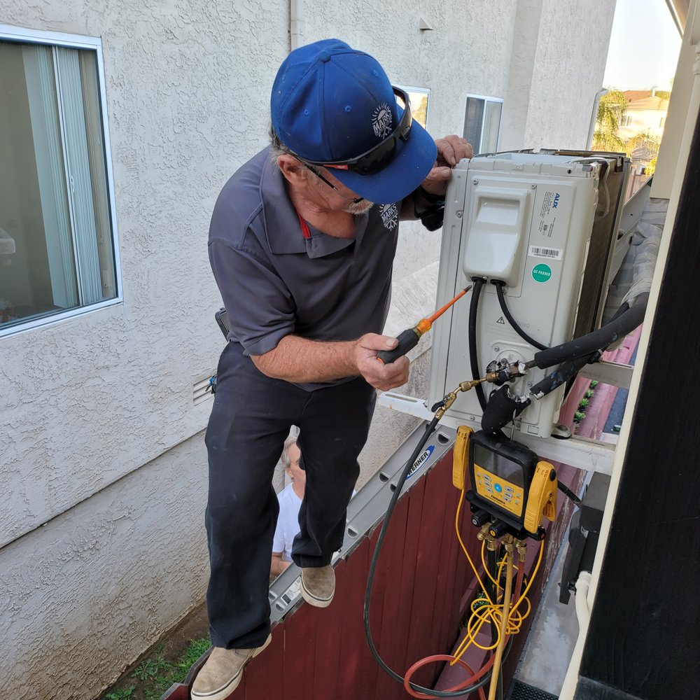 Mark's Heating And  Air - Mark balancing on the edge of my fence, I'd guess about 16 feet in the air!! - Heating & Air Conditioning/HVAC Near Me - El Cajon, California
