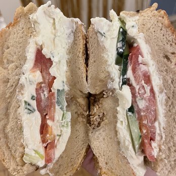 Ess-A-Bagel - sesame bagel with cucumber and tomato - Bagels Near Me - New York, New York Ess-A-Bagel - sesame bagel with cucumber and tomato - Bagels Near Me - New York, New York