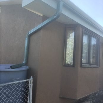 Thermaflo Contracting Services - Gutter, down spout, and rain collector barrel. - Insulation Installation Near Me
