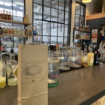 8th Day Distillery - a paper bag on the counter - Distilleries Near Me - Indianapolis, Indiana 8th Day Distillery - a paper bag on the counter - Distilleries Near Me - Indianapolis, Indiana