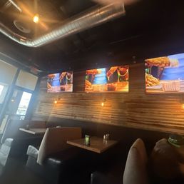Seating area lots of TV's to watch games